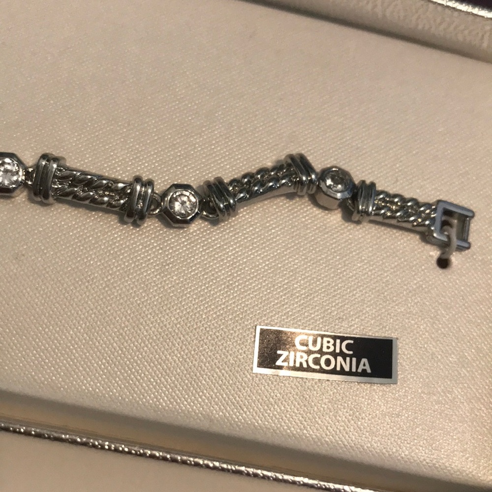 Boxed silver tone cubic zirconia bracelet